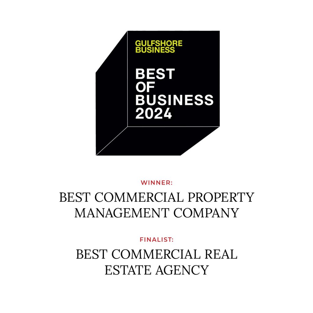 A black 3D box with "Gulfshore Business Best of Business 2024." Text below highlights a win for Best Commercial Property Management Company and a finalist spot for Best Commercial Real Estate Agency.